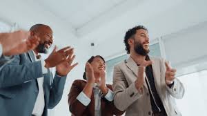 Specialist team in a huddle reviewing charts